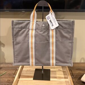 Hermès Ginza Limited Fourre Tout MM tote bag in gray canvas with orange stripe
